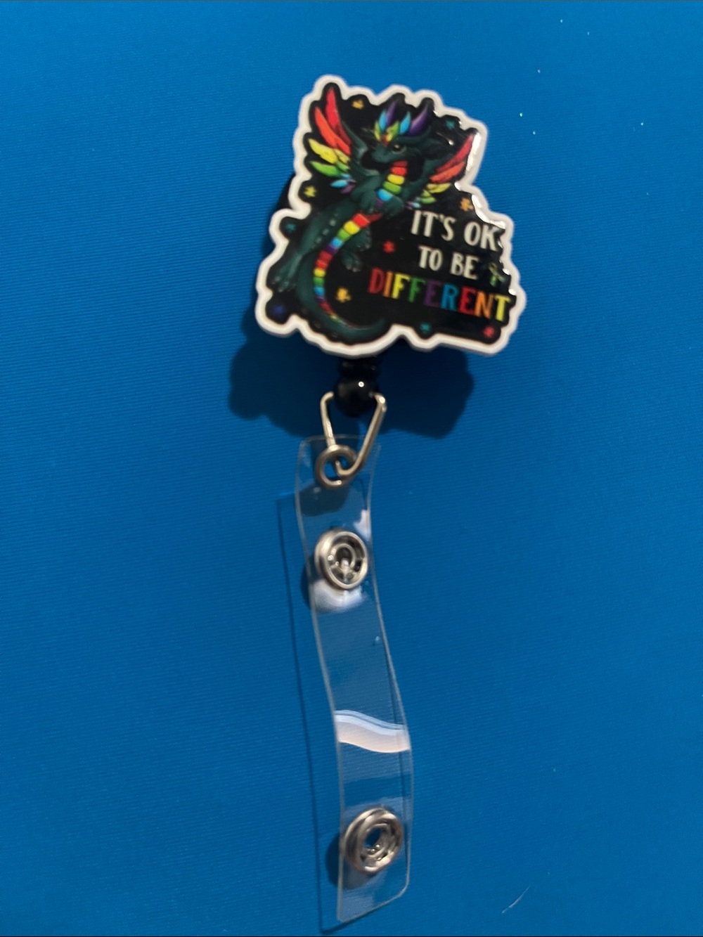 Rainbow Dragon Badge Reel - "It's OK To Be Different"